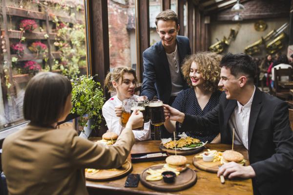 friends eating conversating restaurant